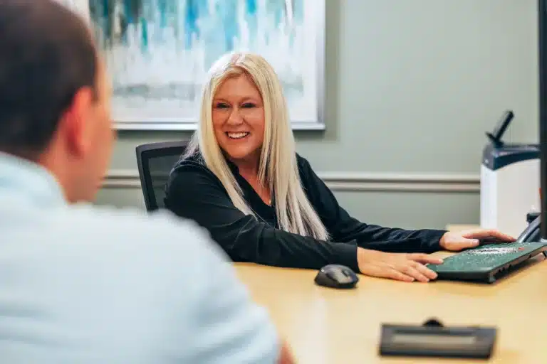 PeoplesChoice Branch Manger speaking with a member.