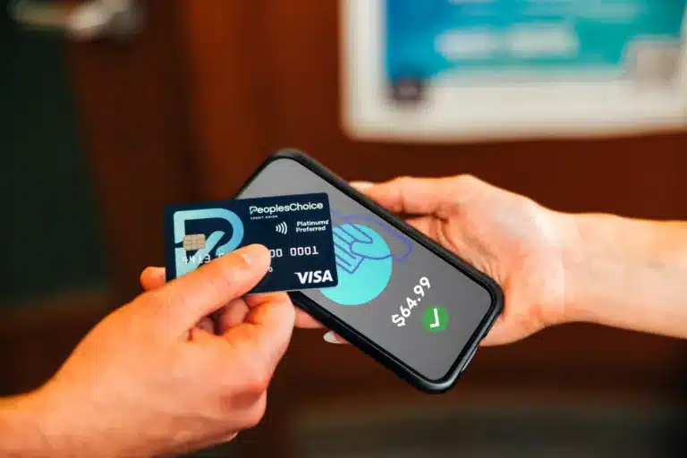 A PeoplesChoice member makes a tap-to-pay credit card purchase.